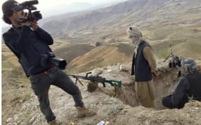 Hossaini filming anti-Taliban force positions in Balkh province, 2021.