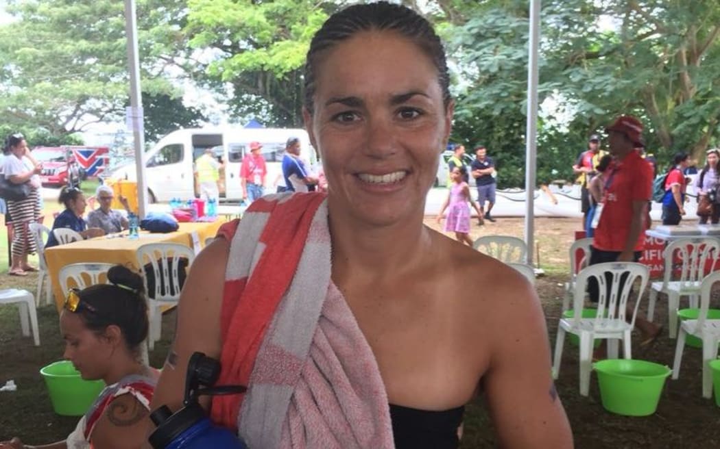 New Caledonia's Charlotte Robin wins her third women’s open water title at the Pacific Games in Samoa.