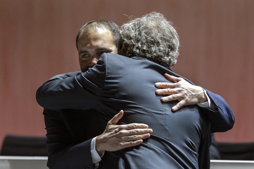 Prince Ali bin al Hussein (left) is greeted by UEFA President Michel Platini before the start of the FIFA Congress.