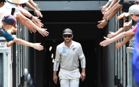 Kane Williamson walks out onto the MCG.