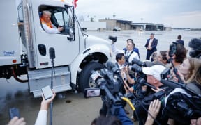 GREEN BAY, WISCONSIN - OCTOBER 30: Republican presidential nominee, former President Donald Trump holds a press conference from inside trash hauler at Green Bay Austin Straubel International Airport on October 30, 2024 in Green Bay, Wisconsin. With less than a week until Election Day, Trump is campaigning for re-election in the battleground states of North Carolina and Wisconsin. (Photo by Chip Somodevilla/Getty Images)