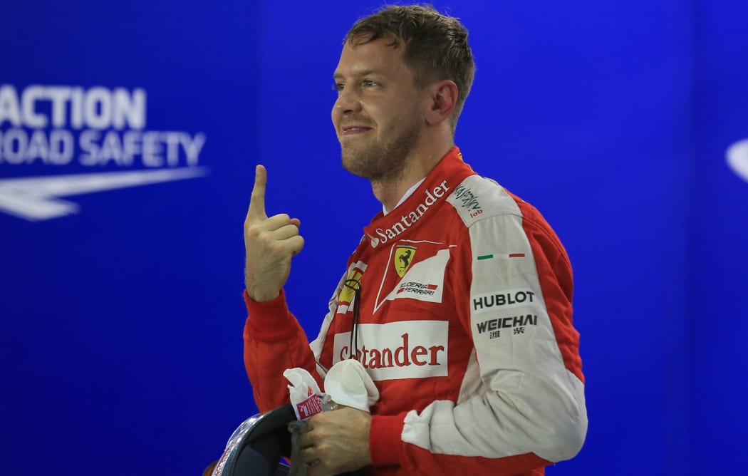 Sebastian Vettel wins pole position, Singapore, 2015.