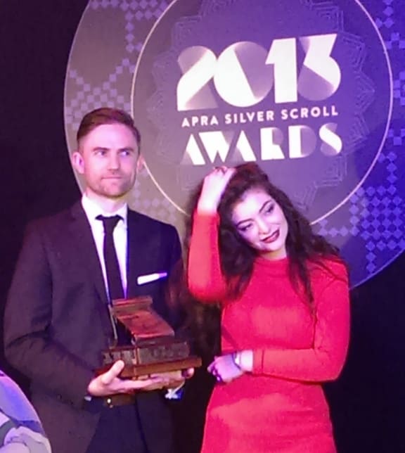 Producer Joel Little with Lorde after receiving the Silver Scroll award.