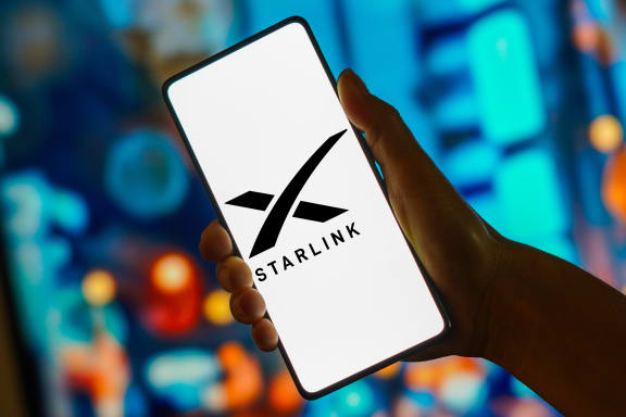 November 3, 2023, Brazil. In this photo illustration, the Starlink logo is displayed on a smartphone screen