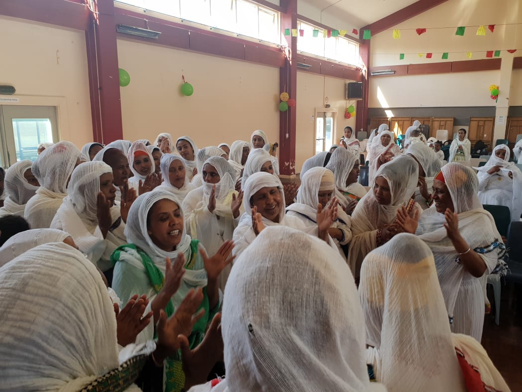 Wellington's Ethiopian community celebrating new priest.