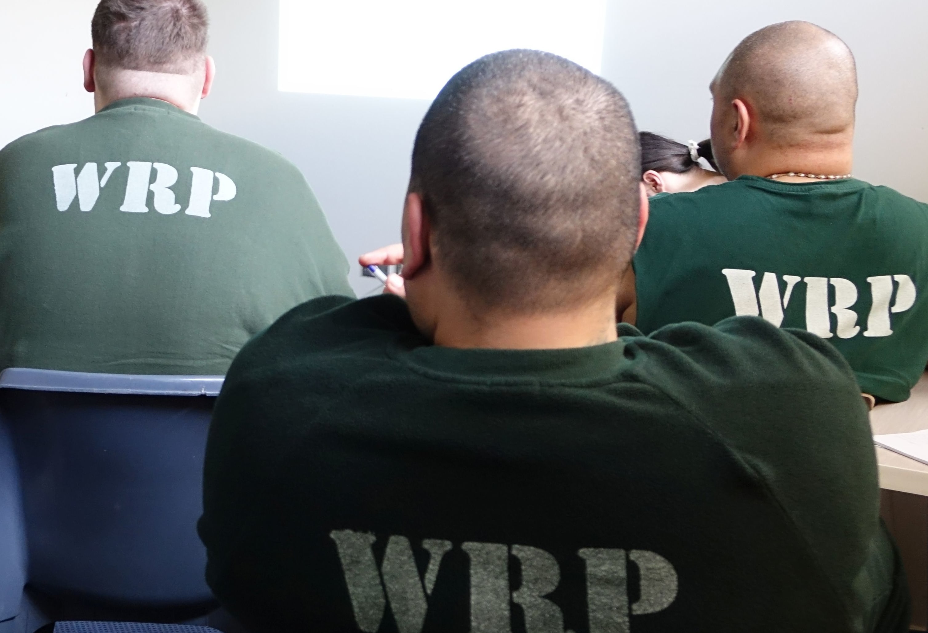 Brenda Allen-Browne speaking with prisoners at Rimutaka Prison.