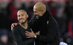 David Silva of Manchester City and Pep Guardiola manager of Manchester City.