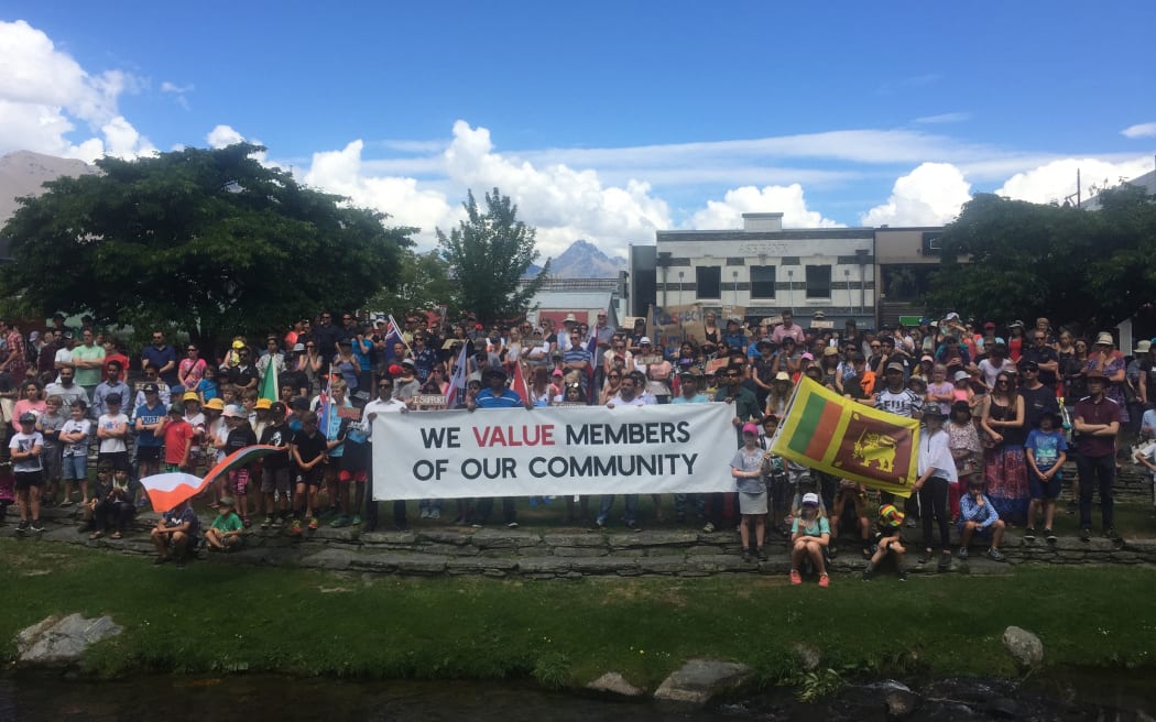 Several hundred people marched through the centre of Queenstown today in support of a Sri Lankan family facing deportation.