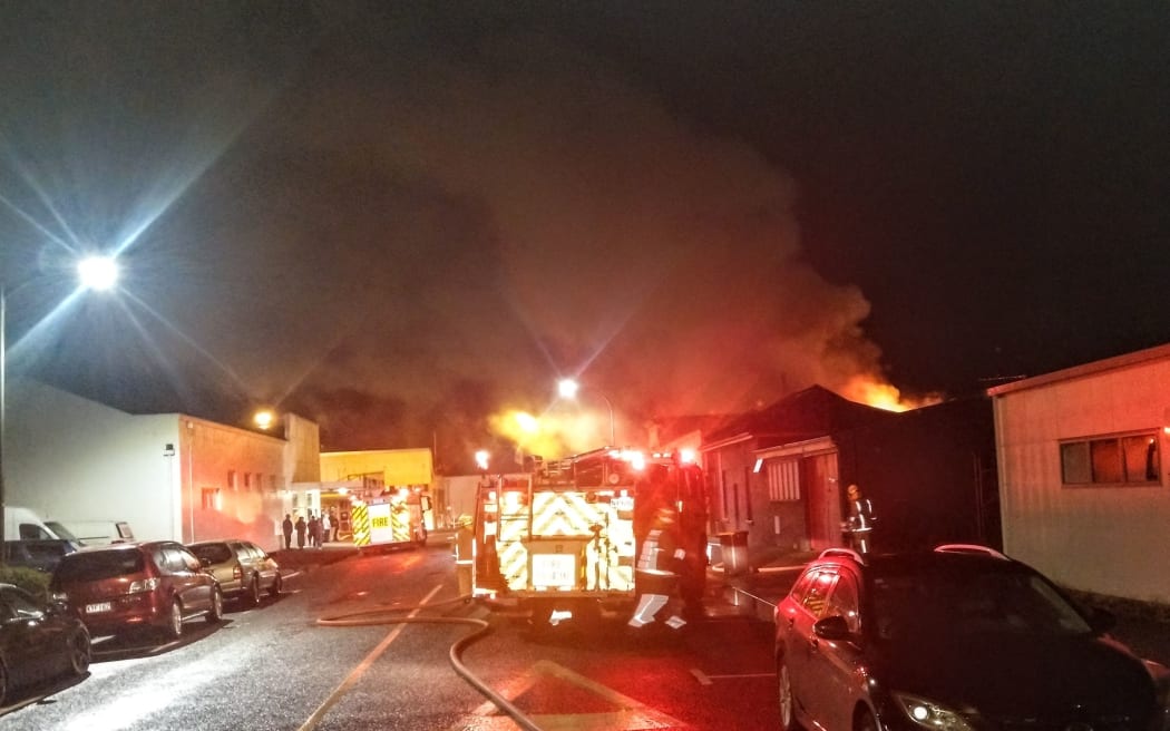 Firefighters at the scene of the fire at the Pizza Box in Paeroa.