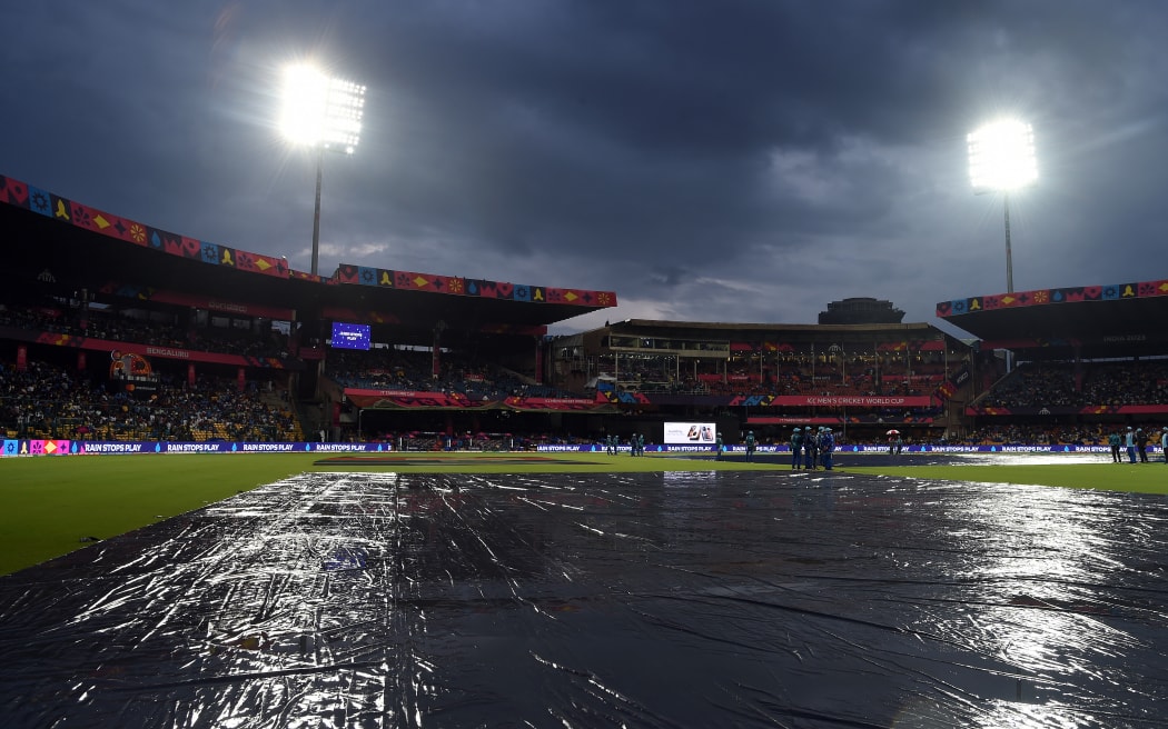Rain stops play during the ICC Cricket World Cup match at the M. Chinnaswamy Stadium in Bengaluru, Karnataka, India.