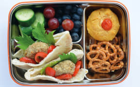 a lunch box filled with homemade snacks with no packaged processed food