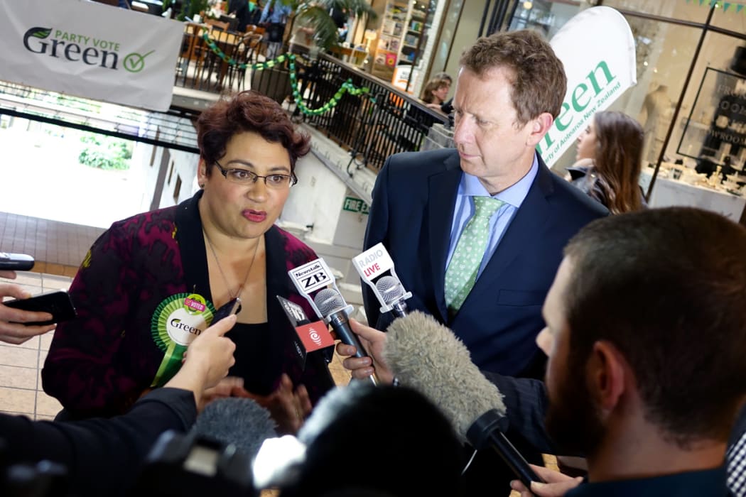 Green Party co-leaders Metiria Turei and Russel Norman speak to media after the party's election closing event.