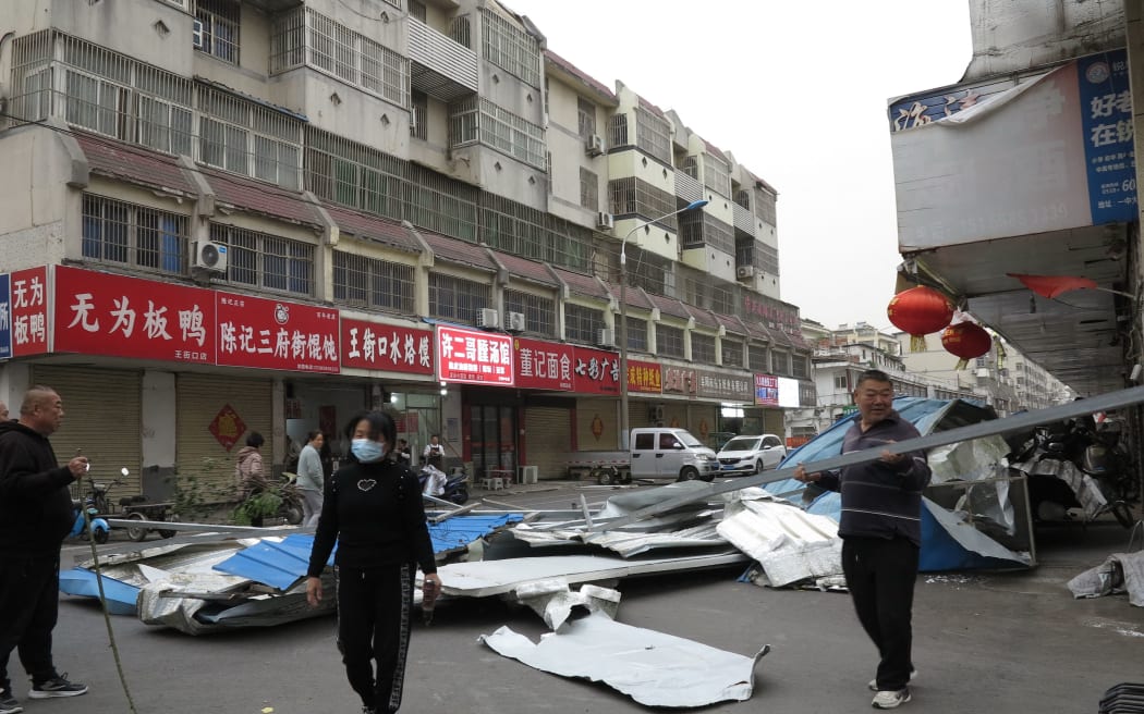 Parts of an iron-sheet building that was blown over by strong winds in Fuyang city, Anhui province, China, on 12 April, 2025.