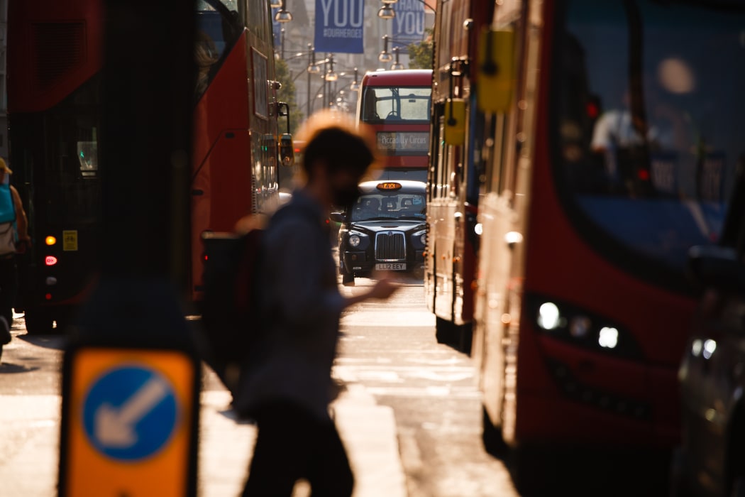 Buses and taxis wait at traffic lights on Oxford Street in London, England, on September 16, 2020. While the UK continues to edge towards economic recovery some 3,991 new coronavirus cases were recorded today, in what is the highest daily figure in the country since May 8.