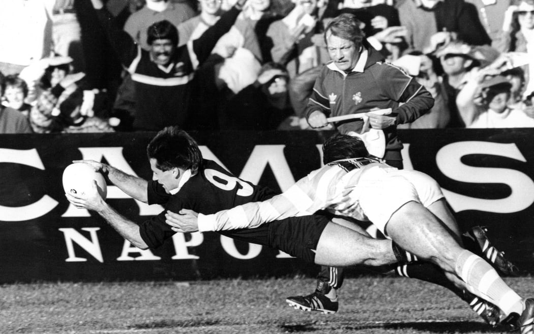 All Black David Kirk scores a try against Argentina at the 1987 Rugby World Cup.