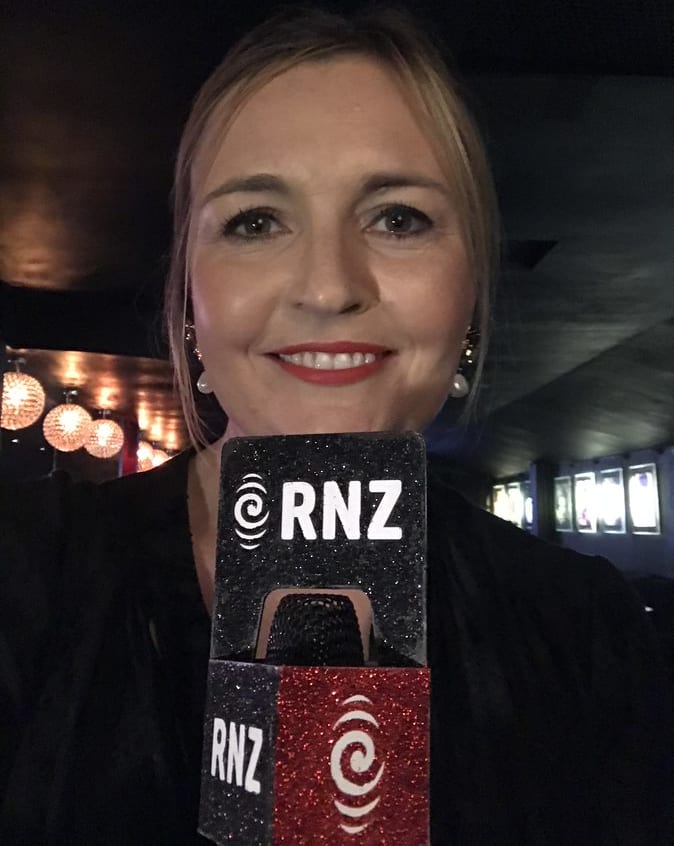 Music 101's Charlotte Ryan showing off her glitter mic flag at the APRA Silver Scrolls