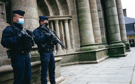 Members of the police force monitor a place of worship after the two attacks in Nice and Avignon and the disconnection of the red level from the vigipirate plan.