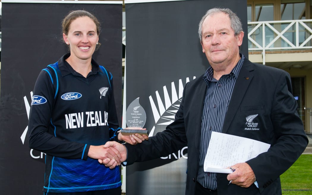 White Fern Amy Satterthwaite receives her player of the match award.