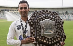 Auckland batsman Jeet Raval with the Plunket Shield.