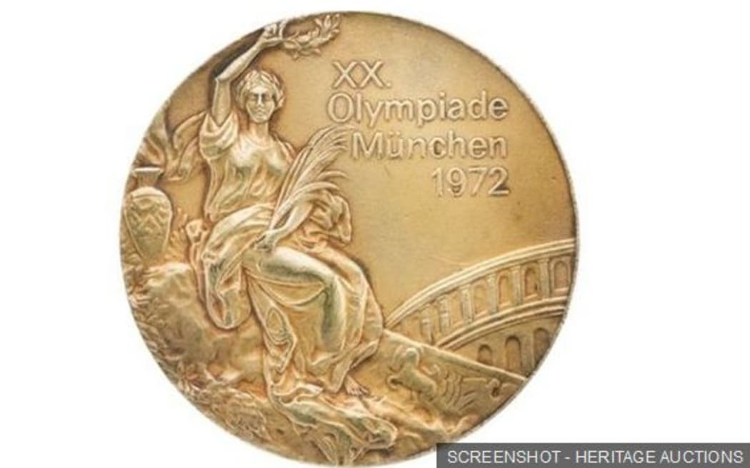 One of the Olympic gold medals Olga Korbut has sold.