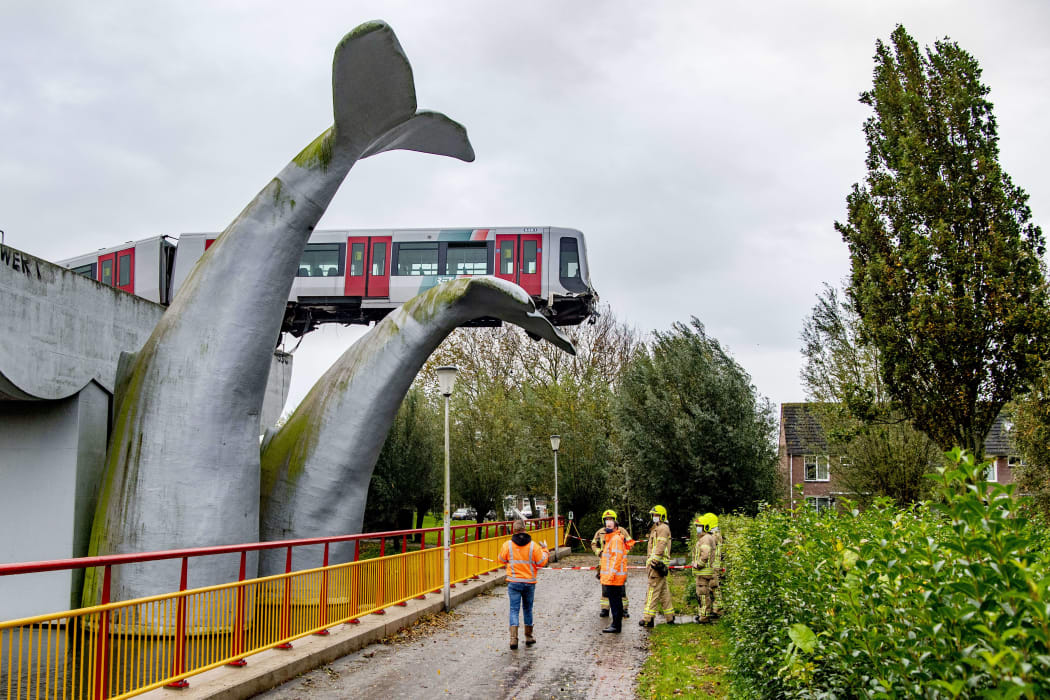 A metro train shot through a stop block at De Akkers metro station and was prevented from plummeting by a sculpture of a whale tail on November 2, 2020.