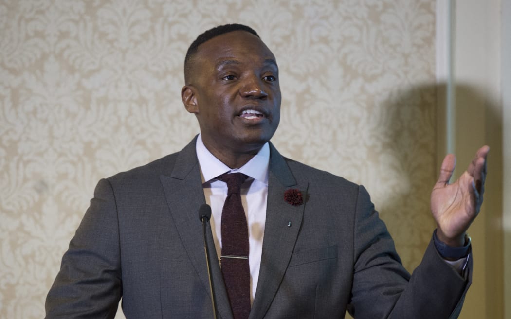 Kwame Jackson, former Apprentice contestant, speaks at a news conference April 15, 2014 in New York. The former contestant claims that a great deal of GOP front runner Trump's conversation has been divisive and extremely dangerous for America. (Photo by DON EMMERT / AFP)