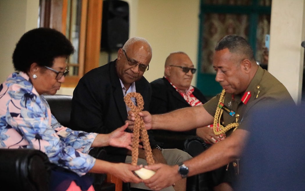 Ro Teimumu, left, accepted the traditional offering on behalf of the GCC.