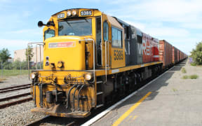 A northbound freight train at the Rangiora Station.