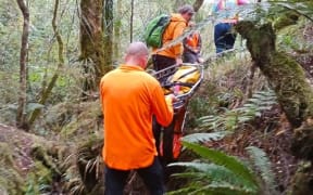 LandSar volunteers check out the route for stretcher ops.