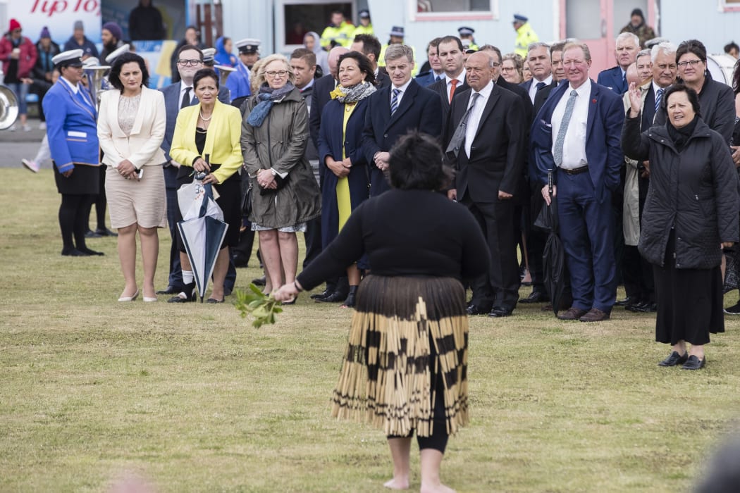 Bill English (centre) being welcomed onto Ratana Pā.
