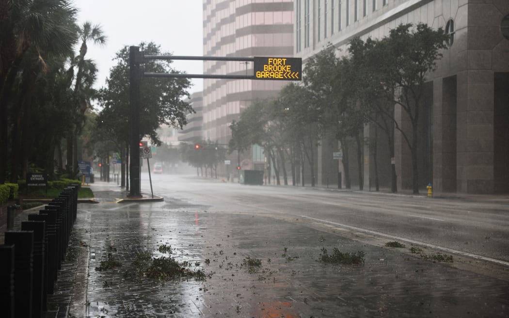 TAMPA, FLORIDA - OCTOBER 09: Tampa prepares for the arrival of Hurricane Milton on October 09, 2024 in Tampa, Florida. Milton, which comes just after the recent catastrophic Hurricane Helene, has strengthened to a Category 4 storm as it approaches Florida’s Gulf Coast and is expected to make landfall late Wednesday.   Spencer Platt/Getty Images/AFP (Photo by SPENCER PLATT / GETTY IMAGES NORTH AMERICA / Getty Images via AFP)