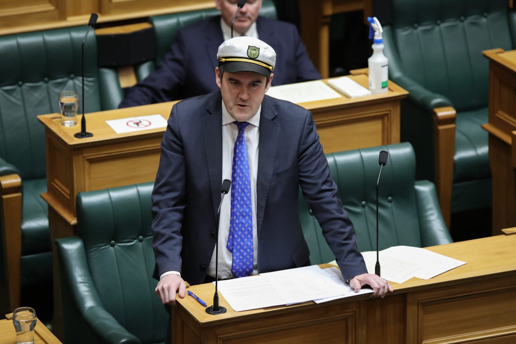 National MP Chris Bishop in a 'Steady the Ship' cricket hat
