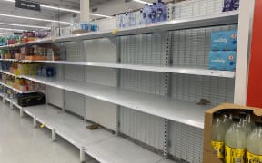 Some supermarket shelves in Brisbane were bare on Friday.