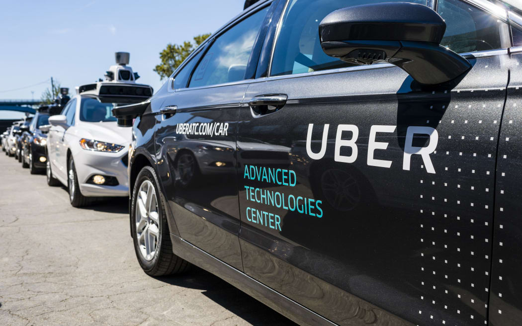 In this file photo taken on September 13, 2016, pilot models of the Uber self-driving car are displayed at the Uber Advanced Technologies Center in Pittsburgh, Pennsylvania.