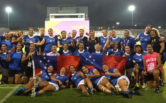 Manusima Samoa players celebrate following the WXV 3 2024 match between Samoa v Madagascar at The Sevens 2 Stadium on October 11, 2024 in Dubai, United Arab Emirates, as they qualify for the 2025 Women's Rugby World Cup.  Photo: Christopher Pike - World Rugby/World Rugby via Getty Images