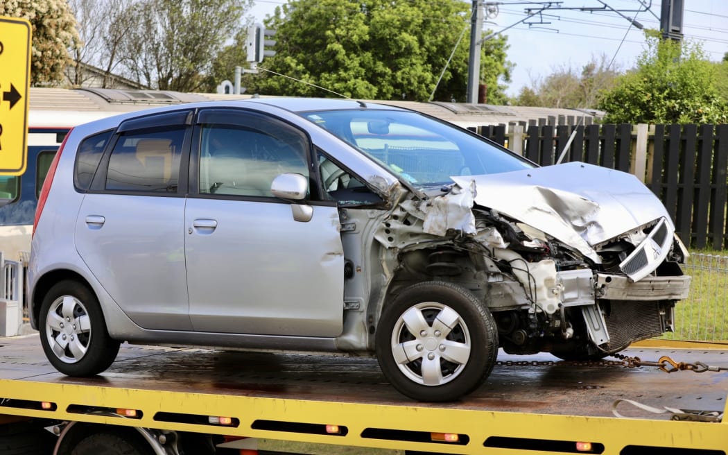 Train hits car on Auckland's western line