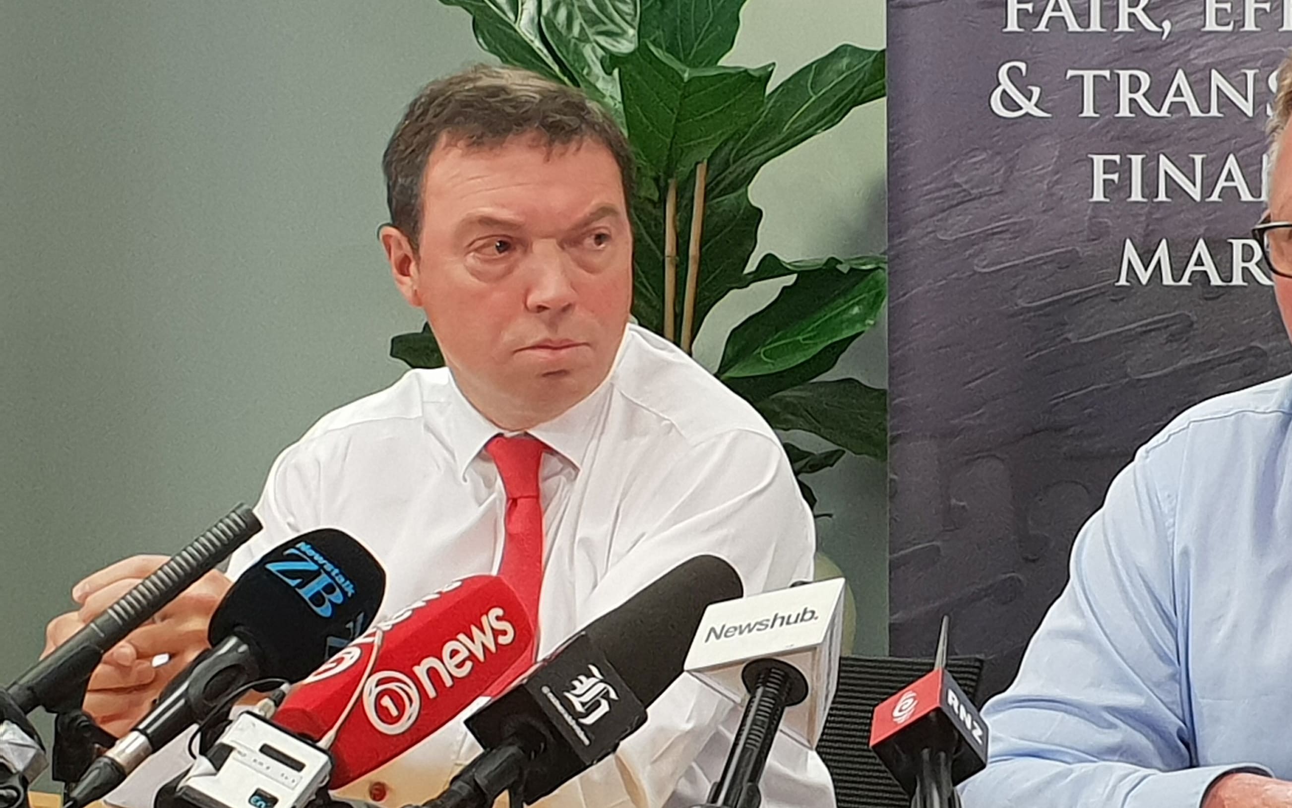 Financial markets authority head Rob Everett (left) and RBNZ Governor Adrian Orr talk about the insurance report.