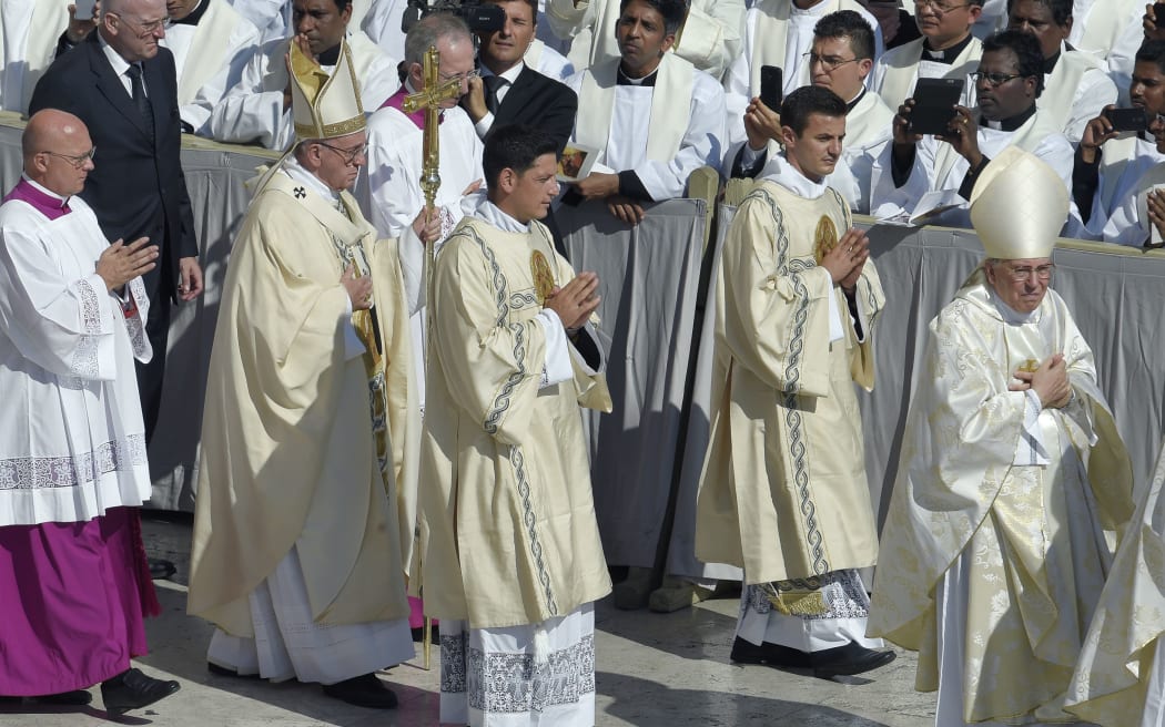 Pope Francis (2nd-L) arrives to lead a Holy Mass and canonisation of Mother Teresa of Kolkata, on Saint Peter square in the Vatican.