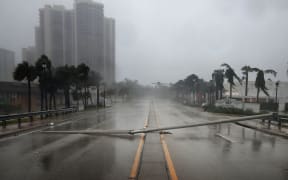 East Oakland Park Boulevard is completely blocked by a downed street light pole as Hurricane Irma hits the southern part of the state near Fort Lauderdale.