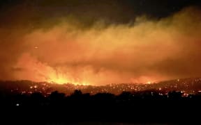 This handout photo from the CFA Wandong Fire Brigade posted on their Facebook page taken on January 7, 2026 and released on January 8 shows a bushfire burning near the town of Longwood, northern Victoria. Firefighters warned millions of Australians of "catastrophic" bushfire dangers on January 8 as they battled multiple blazes stoked by a heatwave blanketing the country. (Photo by Kylie Shingles / CFA WANDONG FIRE BRIGADE / AFP) / NO USE AFTER FEBRUARY 6, 2026 01:54:40 GMT - NO USE AFTER FEBRUARY 6, 2026 01:54:40 GMT - RESTRICTED TO EDITORIAL USE - MANDATORY CREDIT "AFP PHOTO/CFA WANDONG FIRE BRIGADE/KYLIE SHINGLES - NO MARKETING NO ADVERTISING CAMPAIGNS - DISTRIBUTED AS A SERVICE TO CLIENTS /