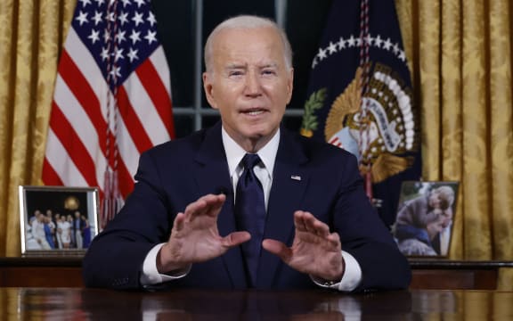 WASHINGTON DC - OCTOBER 19: U.S. President Joe Biden addresses the nation from the Oval Office of the White House on October 19, 2023 in Washington, DC. President Biden discussed the U.S.’s response to the Hamas-Israel conflict, humanitarian assistance in Gaza, and the continued support for Ukraine during Russia’s ongoing invasion.   Jonathan Ernst - Pool/Getty Images/AFP (Photo by POOL / GETTY IMAGES NORTH AMERICA / Getty Images via AFP)