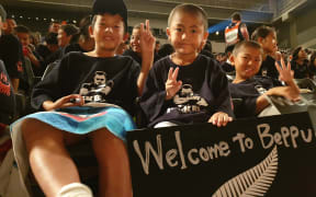 Fans watch Rotorua kapa haka performers and Kiwi band SIX60.