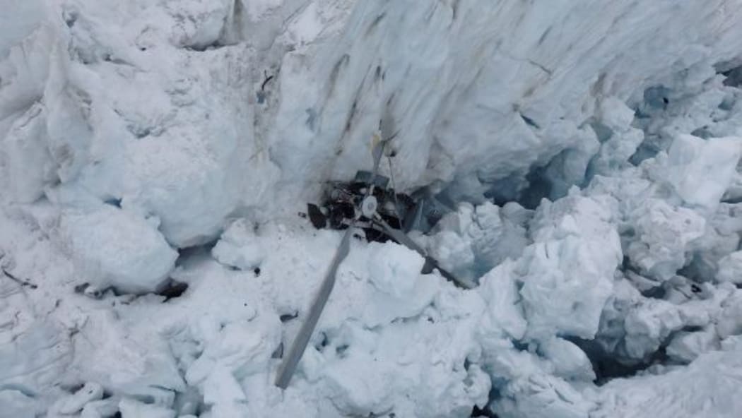 The wreckage of the helicopter on Fox Glacier.