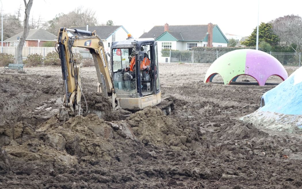 Heavy machinery is being used to clear silt from the Kowhai Park playground and miniature railway.
