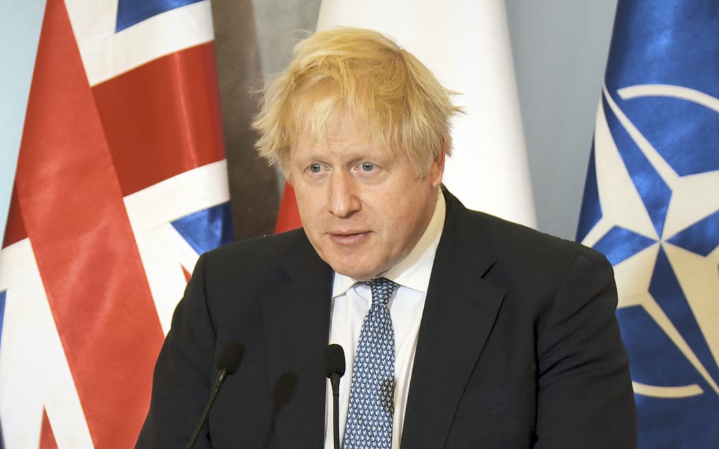 British PM Boris Johnson is seen at a press conference at the Chancellery of the Prime Minister in Warsaw, Poland on 10 February, 2022.