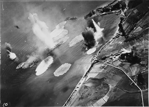 An aerial short of explosions in the ocean.