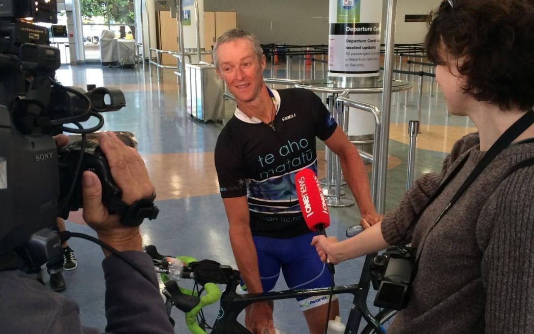 Andrew Nicholson being interviewed at Auckland airport