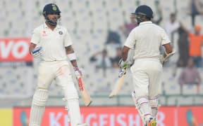 Virat Kohli (L) and Parthiv Patel (R) steer India to a Test win over England.
