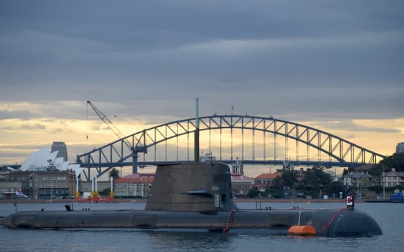 In this photo taken on October 12, 2016, a Royal Australian Navy diesel and electric-powered Collins Class submarine sits in Sydney Harbour. -
