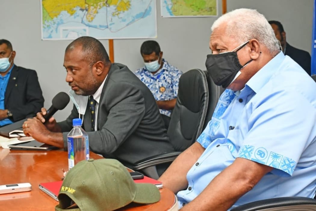 Health Minister Dr Ifereimi Waqainabete and Prime Minister Frank Bainimarama.